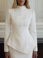 Architectural Ivory: Asymmetric Peplum Mock-Neck Gown