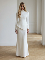 Architectural Ivory: Asymmetric Peplum Mock-Neck Gown